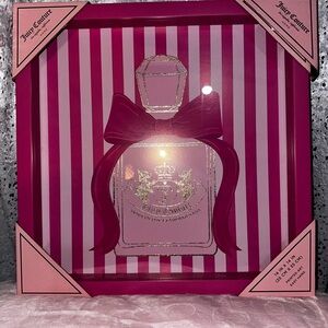 Juicy Couture pink perfume bottle bow wall art